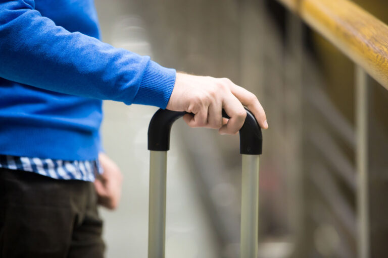 traveler-with-suitcase